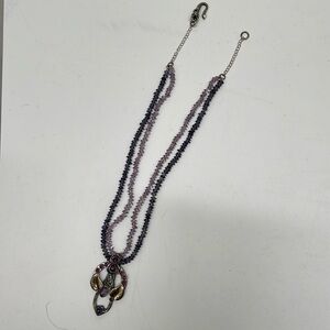 Purple beaded necklace with silver drop in red and amethyst on it. Chain sizes